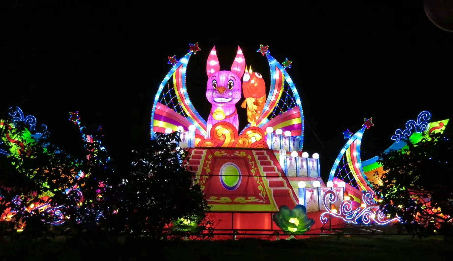 Colorful rabbit and castle lantern scene glowing at night