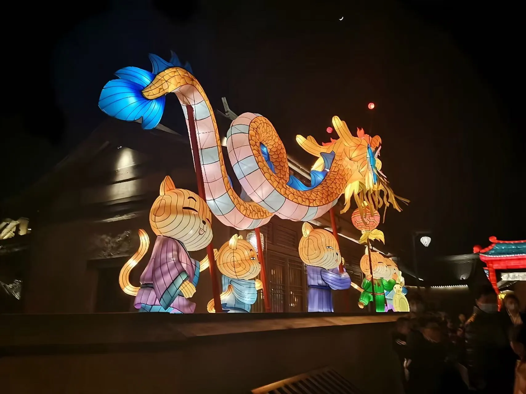 Dragon scene with Miss Cat characters glowing at night