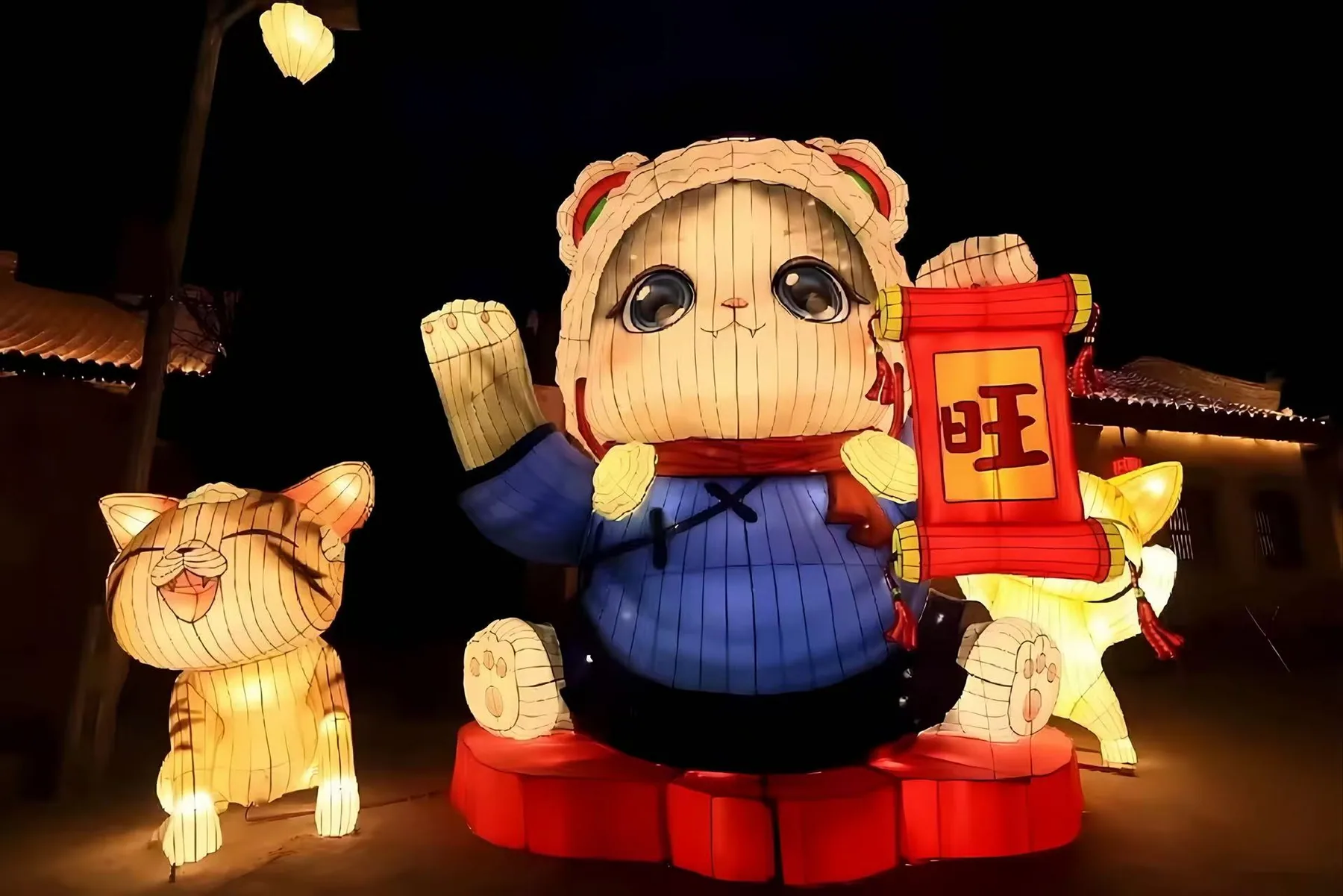 Miss Cat fortune character lantern glowing at night