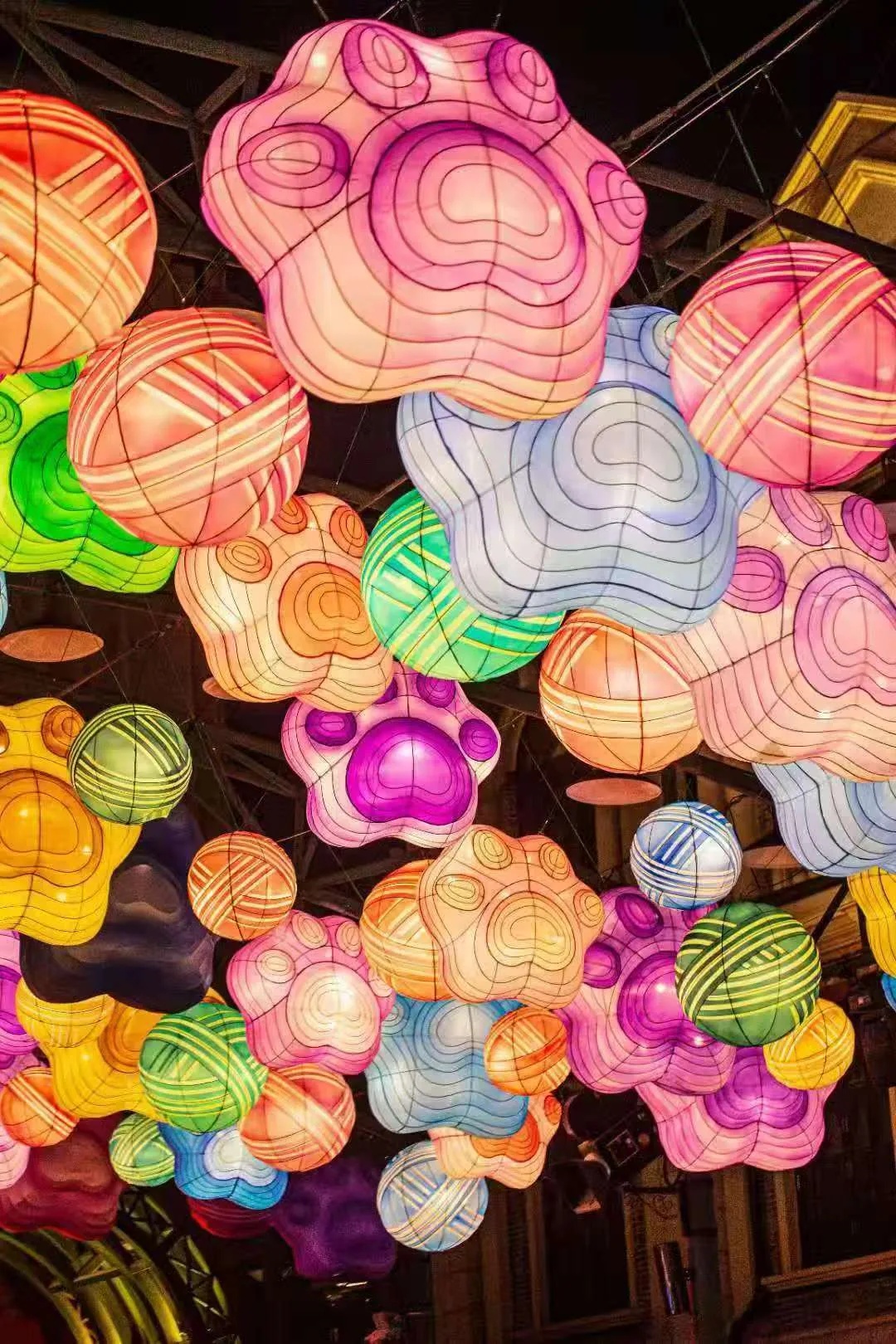 Colorful paw and ball lantern canopy for the Miss Cat route