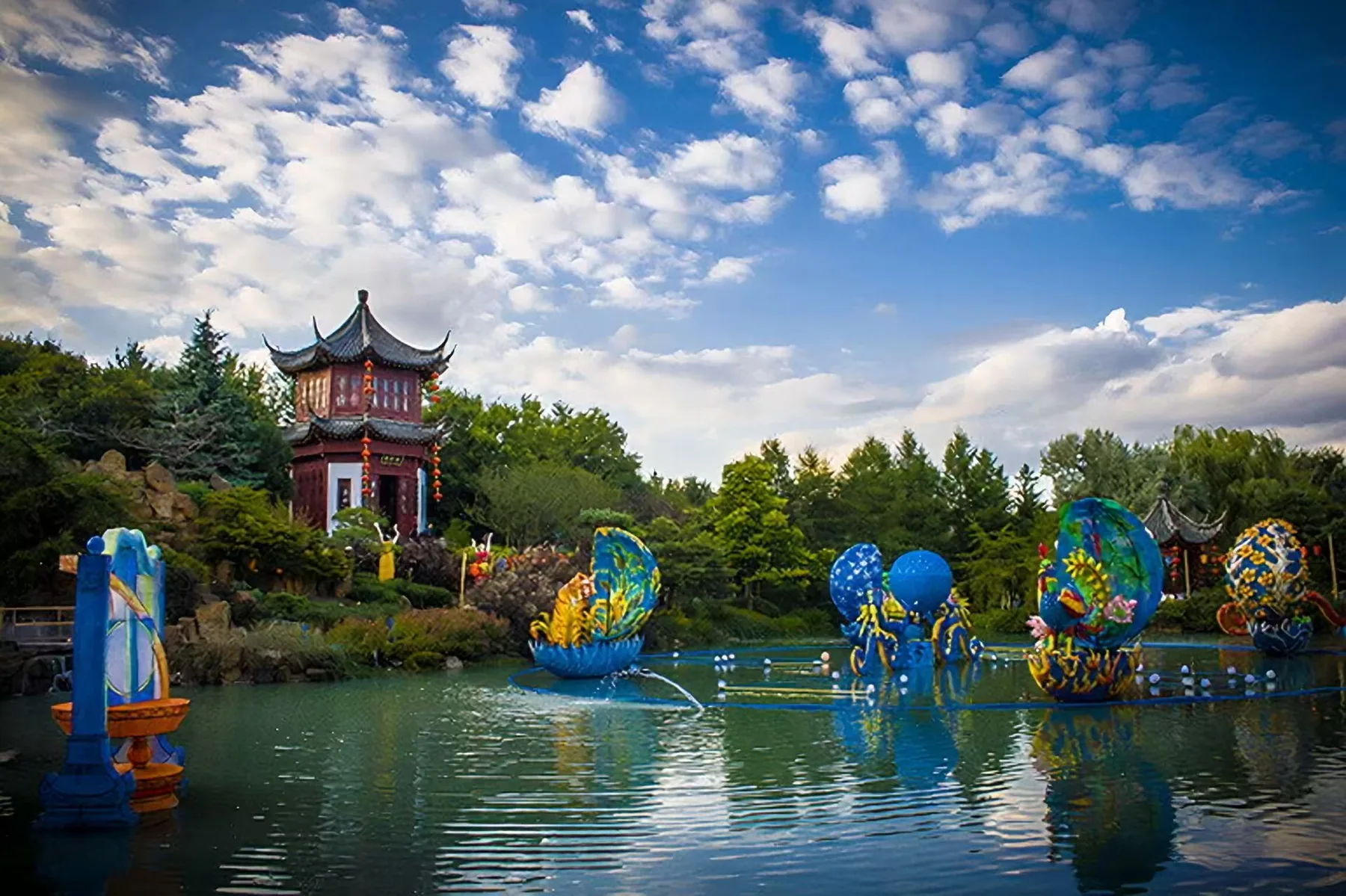 Lantern installations integrated with a garden lake in Montreal