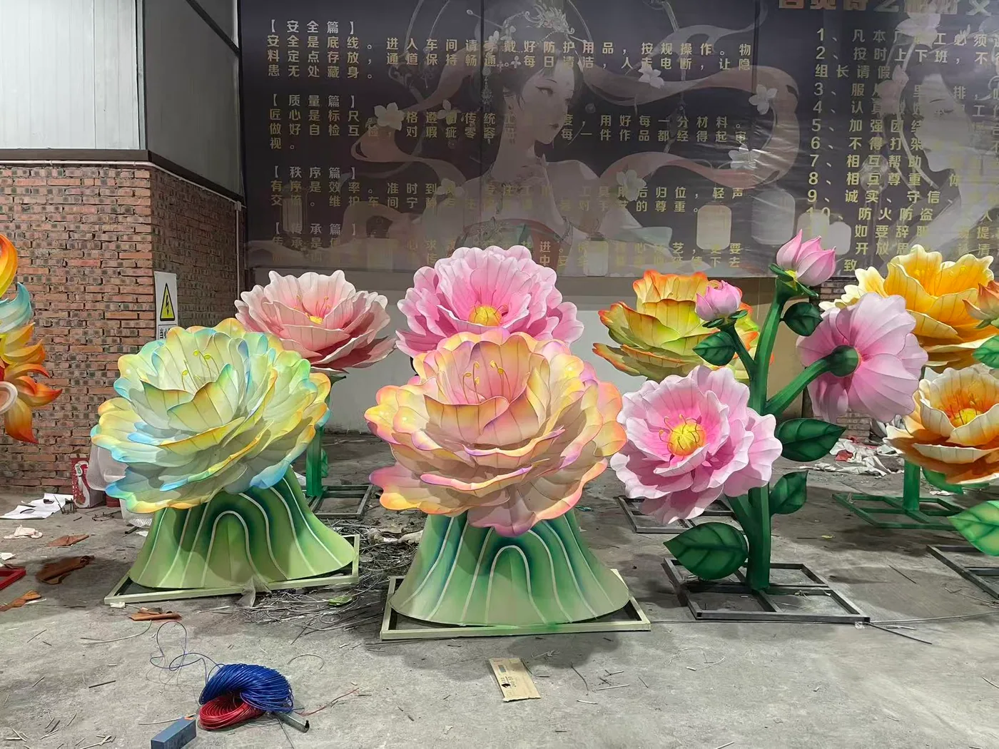Finished illuminated flower lanterns inside the workshop