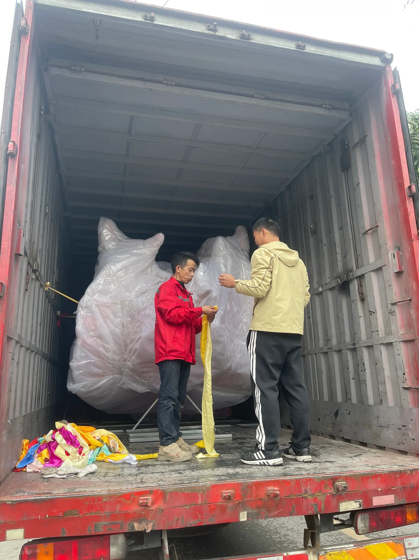 Protected lantern module being loaded into a transport truck
