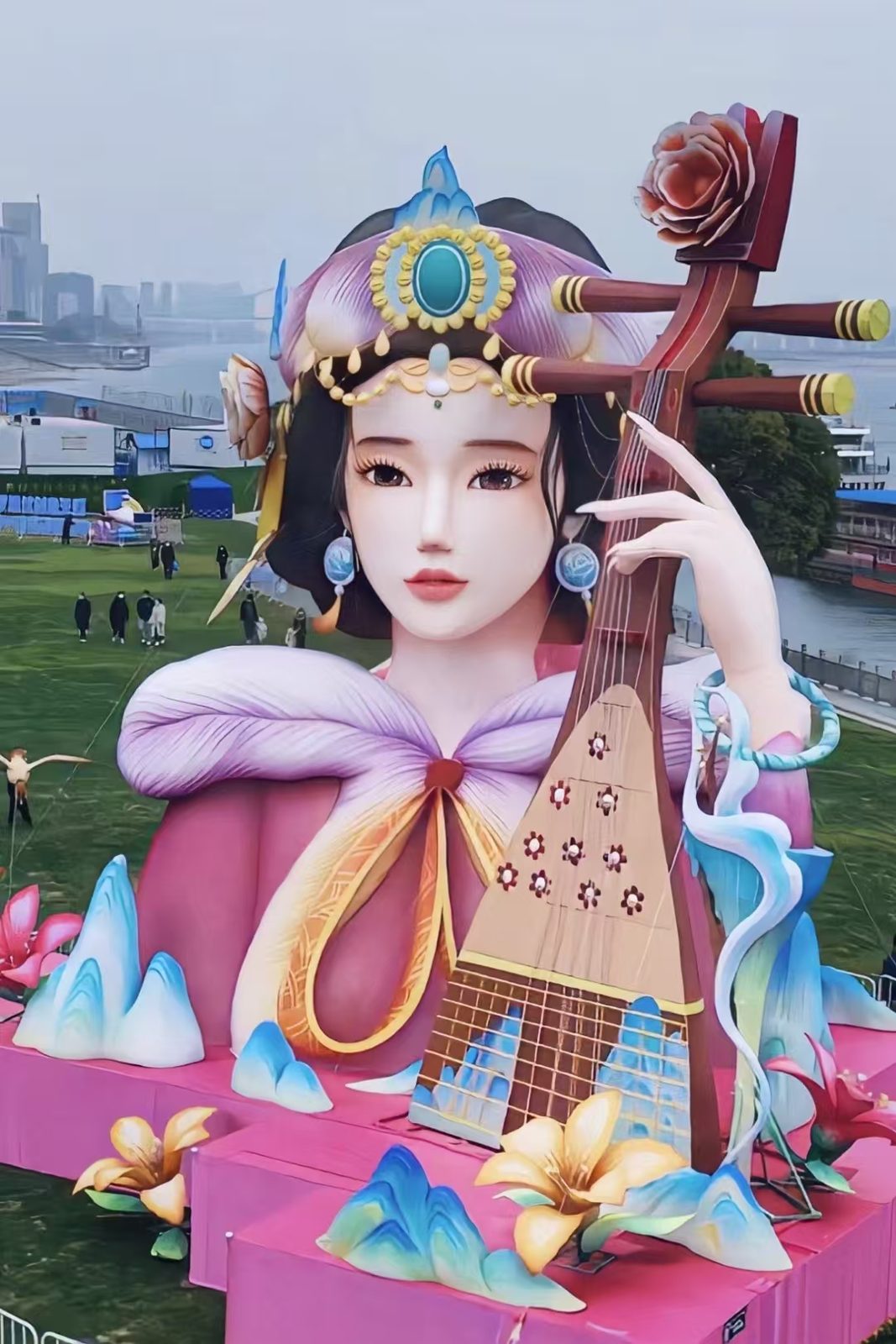 Custom goddess lantern playing the pipa at a riverside lantern festival
