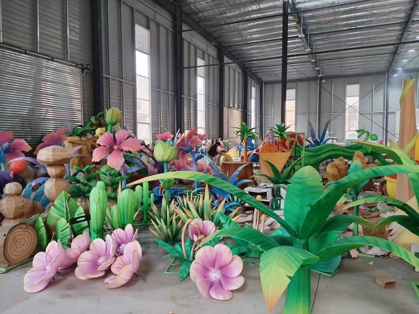 Flower and plant lanterns under fabrication in the Zigong workshop