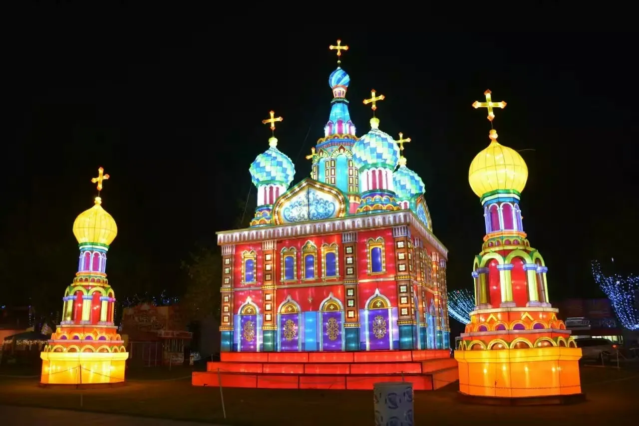 Russian-style cathedral lantern building glowing at night
